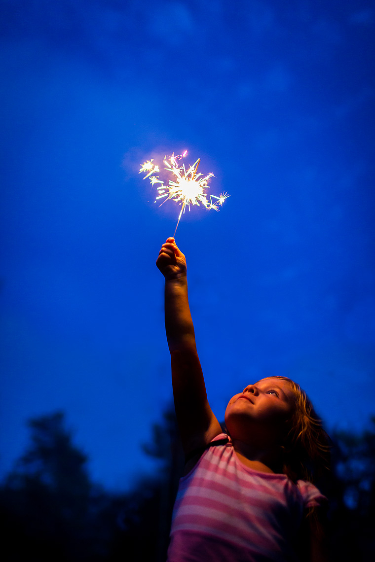 4th of July Sparkler Girl by Dave White Photographer.